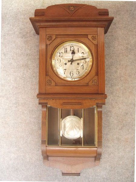 German Enclosed Bottom "Berliner" Style Wall Clock By Gustav Becker In A Walnut Veneered Case With A Matching Crown. Circa 1910-1920. — Antique Clocks Price Guide