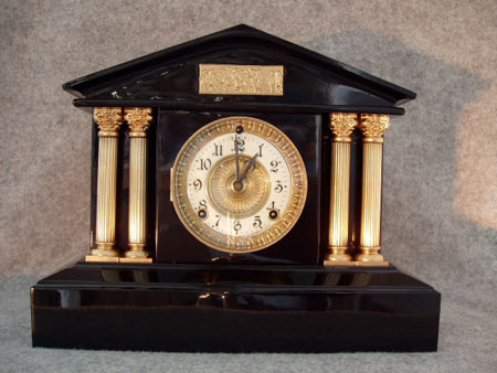 Ansonia "Capri" Black Enamel Cast Iron Mantel Clock. Circa 1900 — Antique Clocks Price Guide