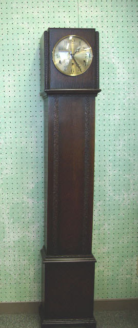 Deco Style German Oak Cased Granddaughter Clock With Decorative Moulding And Beading On The Case. Circa 1910-20. — Antique Clocks Price Guide