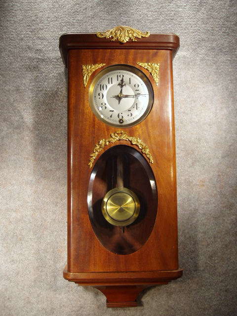 French Box Clock In A Mahogany Case With Brass Mountings And Has An Oval Beveled Glass In The Lower Part Of The Door. — Antique Clocks Price Guide