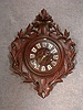 French Cartel Style Wall Clock In A Carved Oak Case, Motif Is A Crest With Oak Leaves. Circa 1880-1890.