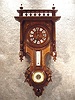 French Weather Station Clock, With A Thermometer And Barometer In A Walnut Case With Carved Pods Beside The Barometer, Single Side Columns And A Widows Walk Crown. Circa 1895-1900