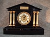 Ansonia "Capri" Black Enamel Cast Iron Mantel Clock. Circa 1900