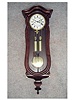 This Is An Austrian Miniature Serpentine Cased Wall Clock In A Mahogany Finish. Circa 1860'S.