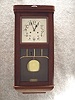German Box Clock In A Dark Oak Case. Circa 1900-1910.