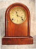 "Round Top" Shelf Clock In A Rosewood Veneered Case, By The Gilbert Clock Co. In Winstead, Ct, Circa 1866-1871.