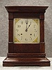"Cabinet No. 27" Mantel Clock By The Ansonia Clock Co, In An Old Oak Case. Circa 1910-1915.