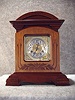 German Mahogany Cased Cabinet Style Mantel Clock By The Junghans Clock Co. Circa 1900-1910.