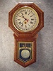 "Star Pointer" Long Drop Wall Clock In An Oak Embossed Case By The Sessions Clock Co. Circa 1908-1915. 