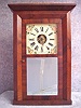 Beveled Case Shelf Clock With A Looking Glass By E. C. Brewster In Bristol, Ct, In A Mahogany Veneered Case. Circa 1840.