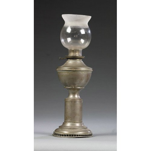 Unusual Clockwork Oil Lamp, — Antique Clocks Price Guide