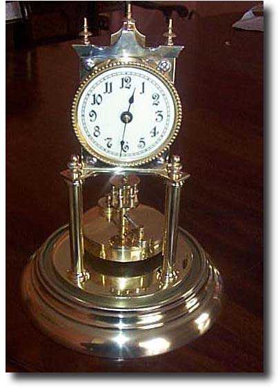 400 Day Disc Anniversary Clock, c. 1910 — Antique Clocks Price Guide
