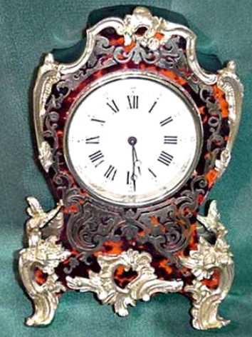 French Boulle miniature mantel clock — Antique Clocks Price Guide