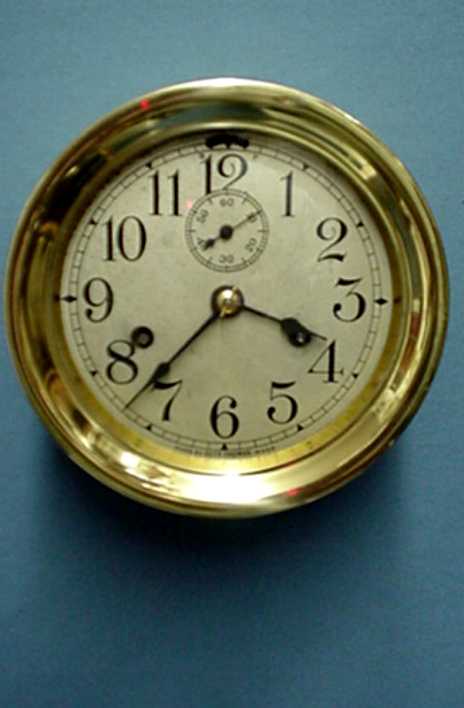 Seth Thomas brass ships bell clock, 7 inch diameter, Circa 1910. — Antique Clocks Price Guide