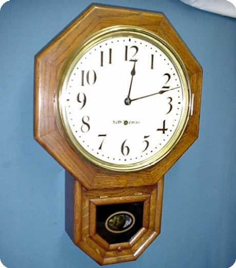 Seth Thomas 8 day Oak Wall Reglator Clock CIRCA: 1909 — Antique Clocks Price Guide