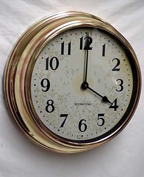 Copper International Wall Clock, 16" diameter, c. 1939 — Antique Clocks Price Guide