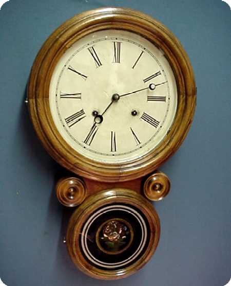 E. Ingraham Ionic Wall Clock 100% Original — Antique Clocks Price Guide