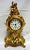 Gold Gilt Jennings Bros. Clock with a Cherub