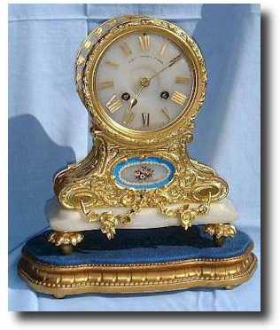 A white onyx and ormolu mantel clock by JB Delettrez, c1884. — Antique Clocks Price Guide