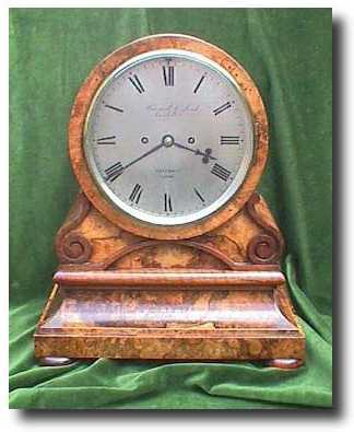 A walnut drum head bracket clock made in 1859 by Barraud and Lund of London. — Antique Clocks Price Guide