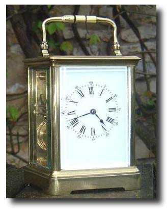 A French carriage clock that strikes "ship's bells" on two gongs. — Antique Clocks Price Guide