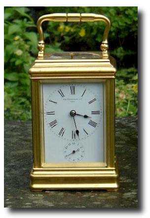 A Drocourt carriage clock in a frosted-gilt cannelee case, with an English Frodsham escapement. — Antique Clocks Price Guide