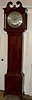 A mahogany longcase clock from the Derby school of influence incorporating the round dial of the area. The case is of particularly good quality with great attention to detail; for example, the carved paterae and the ebony and boxwood stringing.