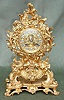 A French gilt bronze clock in rococo style.