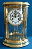 A good quality French Clock circa 1890 in a gilt-brass four-glass case of oval form.