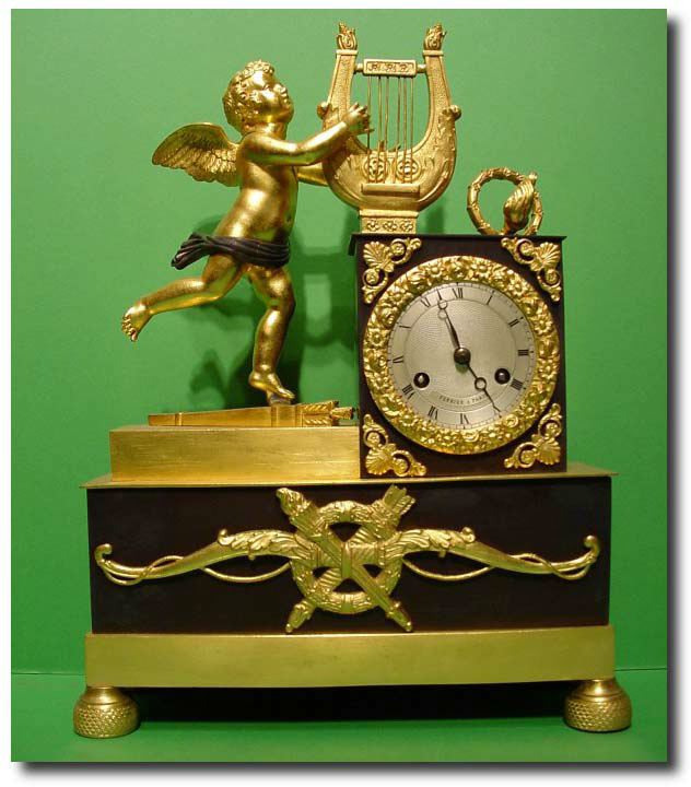 French gilt ormolu and bronze First empire figural mantel clock, circa 1830 — Antique Clocks Price Guide