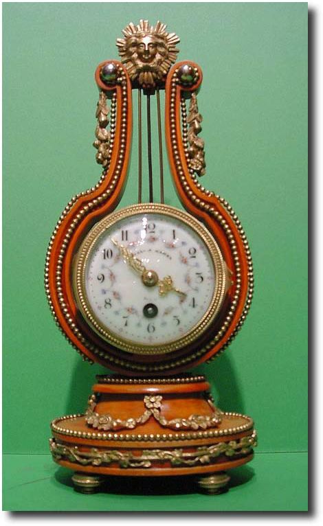 French satinwood and gilt ormolu mounted lyre clock, circa 1900 — Antique Clocks Price Guide