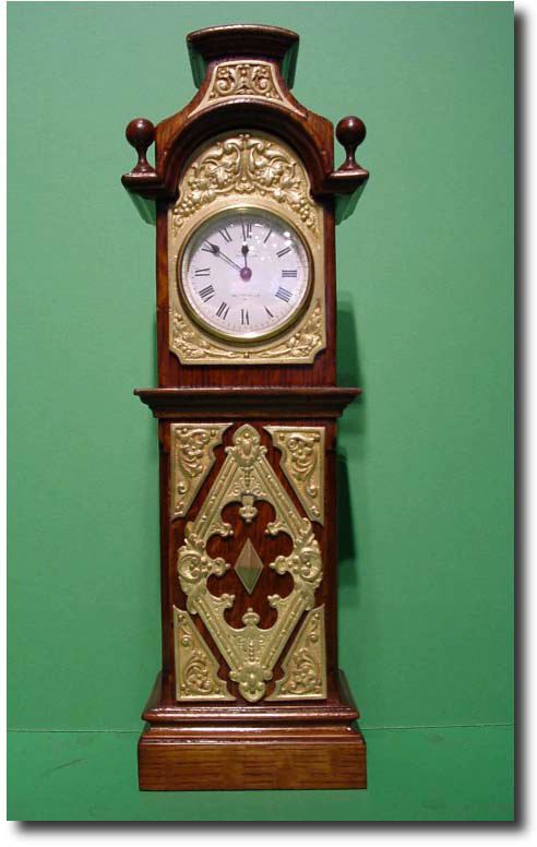 English oak cased miniature longcase clock, circa 1900. — Antique Clocks Price Guide