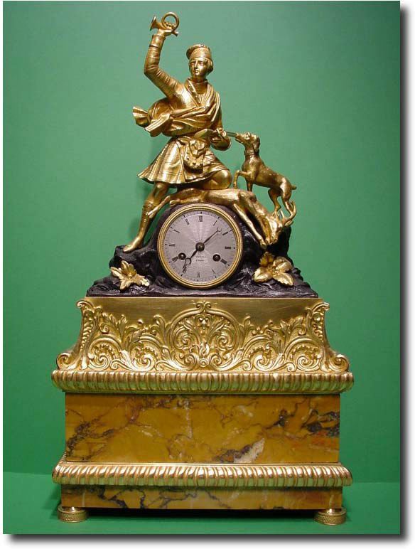 French gilt bronze and Sienna marble figural mantel clock, Circa 1830 — Antique Clocks Price Guide