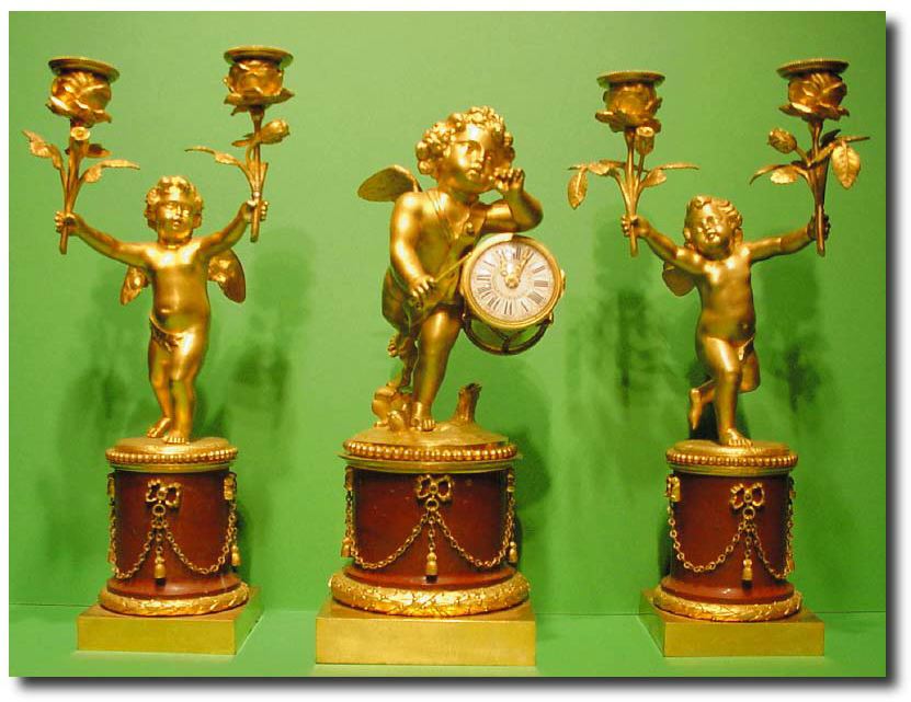 French gilt bronze and rouge marble three piece drummer boy timepiece clock garniture, Circa 1860. — Antique Clocks Price Guide