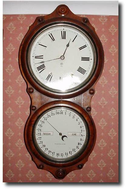 American Seth Thomas walnut perpetual calendar wall clock, late 19th century — Antique Clocks Price Guide