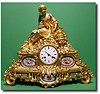 French gilt bronze mantel clock with blue porcelain panels, circa 1880