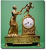 French First Empire gilt ormolu mantel clock by Lugrunge à Paris, circa 1830