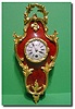 French Louis XIV style red tortoiseshell and gilt ormolu mounted miniature wall clock, Circa 1890