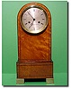 French First Empire birds-eye maple and ebony strung mantel clock