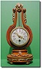 French satinwood and gilt ormolu mounted lyre clock, circa 1900