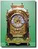 French brown tortoiseshell and cut engraved brass boulle mantel clock, circa 1860.