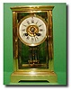 French miniature four glass clock, Circa 1880
