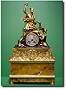 French gilt bronze and Sienna marble figural mantel clock, Circa 1830
