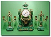 French malachite- veneered chiming portico clock garniture, circa 1880
