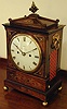 8 day rosewood and brass inlay regency twin fusee bracket clock, with pull repeat. Rigby, Charring Cross, Circa 1825