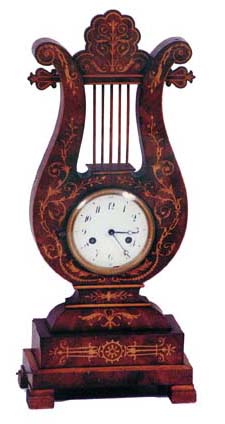Early French imitation Lyre clock. 8 day, silk thread suspension, round movement, outside count wheel, strikes a brass bell half hours. — Antique Clocks Price Guide