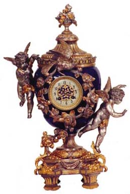 French cobalt blue porcelain urn complete with original base, top, and other ornaments, winged cherubs and dove. — Antique Clocks Price Guide