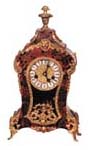 Kienzle-Germany, ca 1920's. Boulle style mantle clock with a plethora of bronze ornaments and inlay on 3 sides of the wood case. — Antique Clocks Price Guide