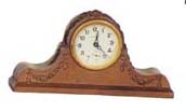 Ansonia Clock Co. novelty clock, metal case, shape of tambour, 7 1/2 inches wide. — Antique Clocks Price Guide