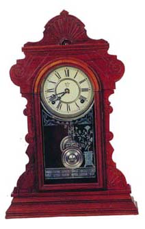 Waterbury Clock Co. "Suffolk", ca 1891. Walnut case was cleaned, polished, and loose pieces nailed tight. — Antique Clocks Price Guide